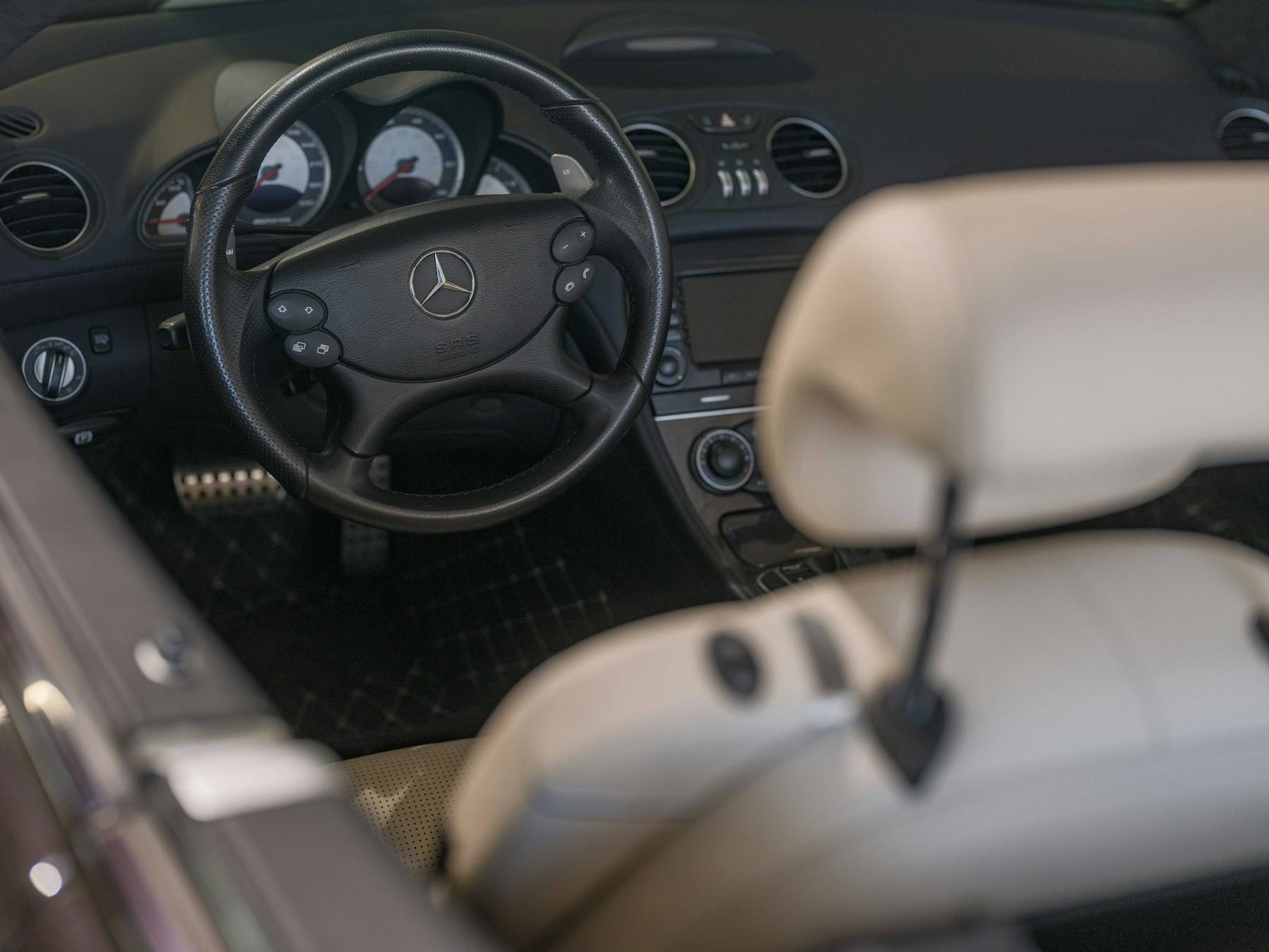 Luxury sedan cabin with spotless dashboard and seats